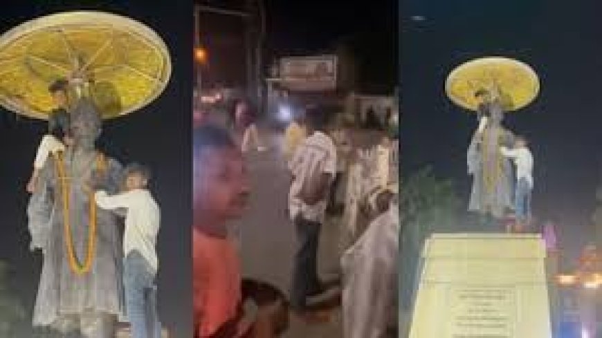 Varanasi : मालवीय प्रतिमा के कंधे पर चढ़ा युवक, वीडियो वायरल होने पर छात्रों में आक्रोश; प्रशासन ने सफाईकर्मी बताया